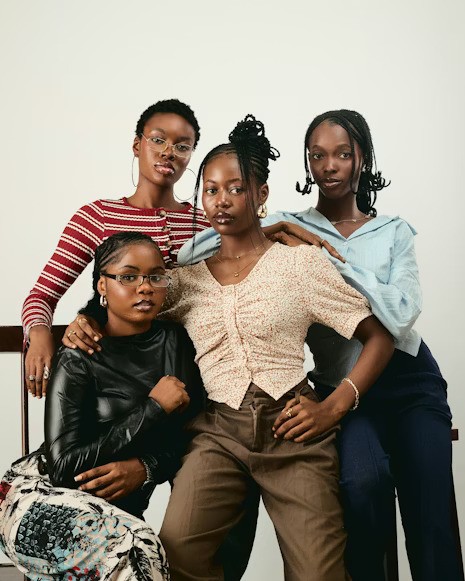 woman in gray hijab and gray coat